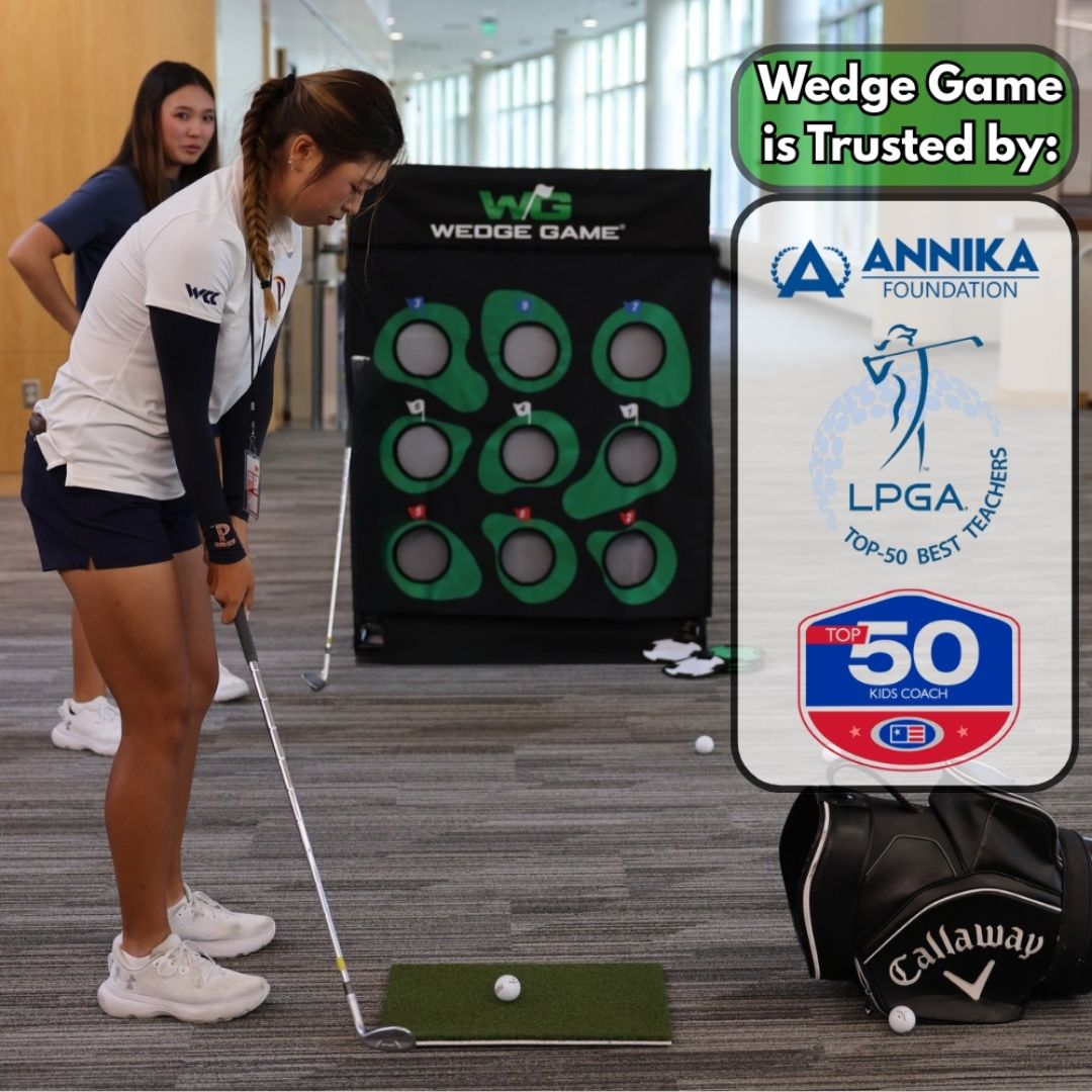 Female golfer chipping into the Wedge Game net at an ANNIKA Foundation event