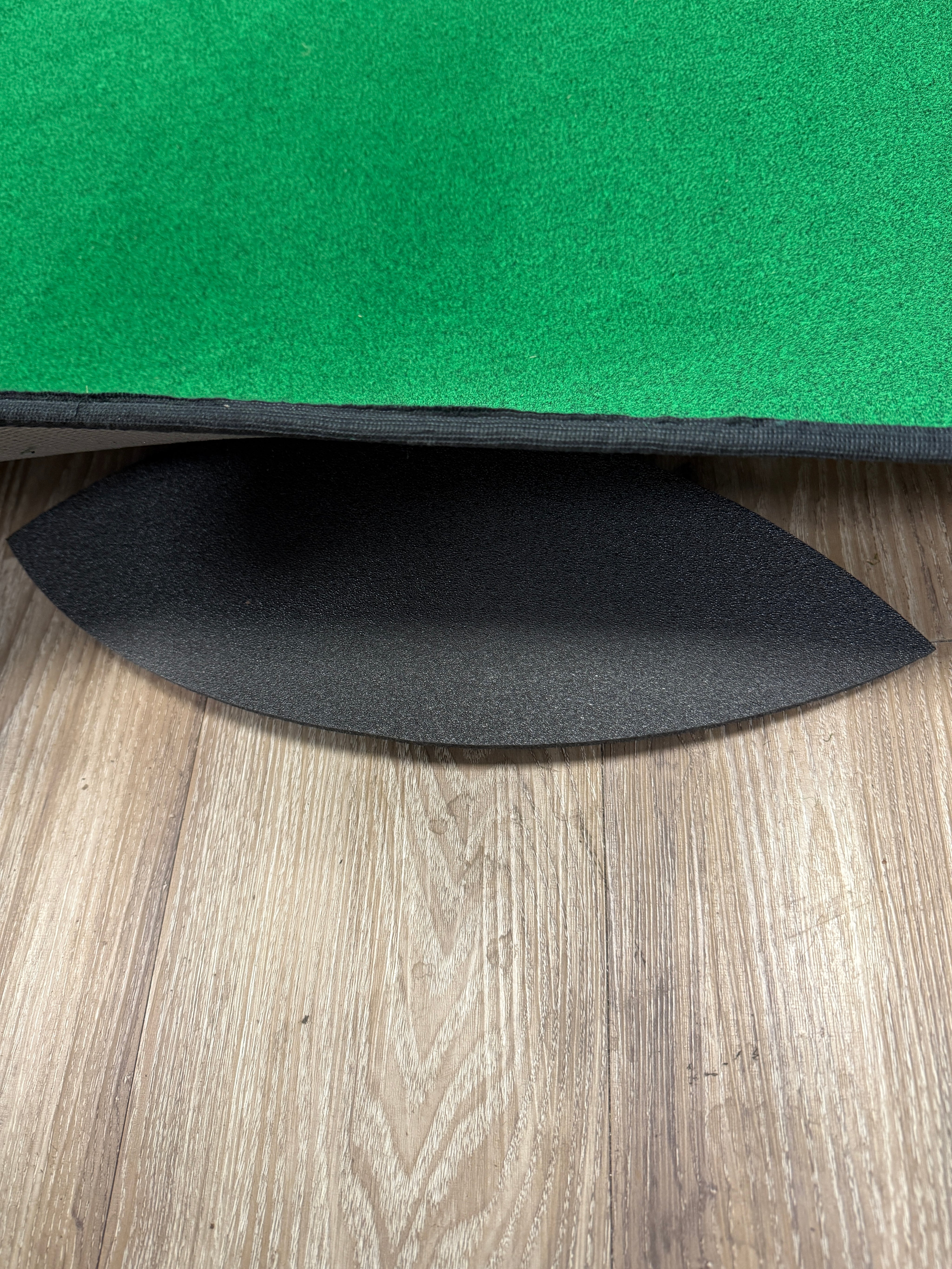 Showing the use of break pads on Wedge Game putting mat