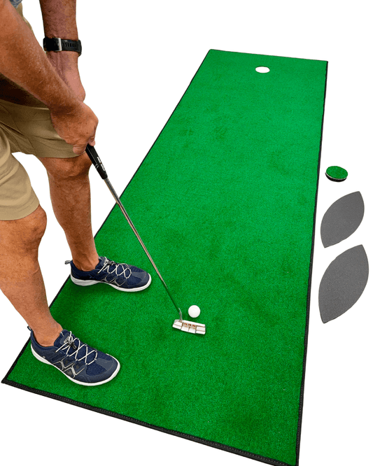 Person practicing putting on a green Wedge Game putting mat with golf ball and putter.